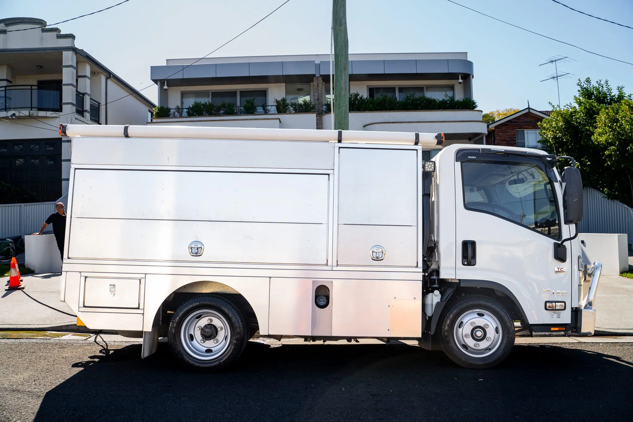 Side profile of the Mr Flow Plumbing service truck
